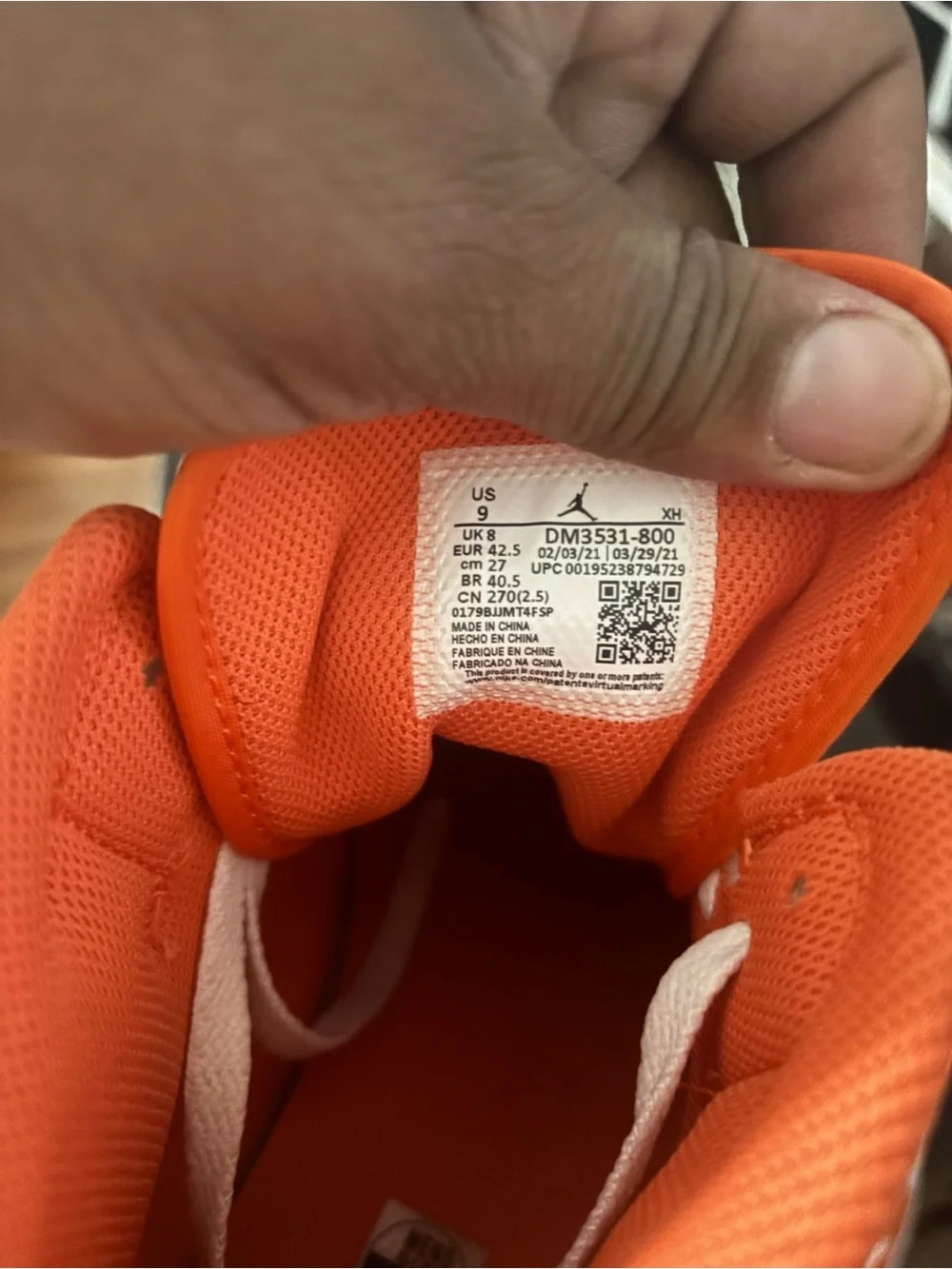 Jordan 1 Mid in White and Metallic Orange
